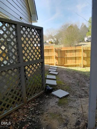 a en suite bathroom with a sink and mirror