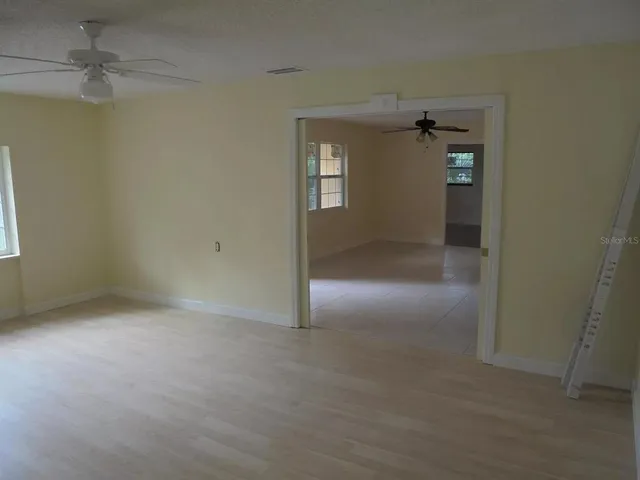 an empty room with windows