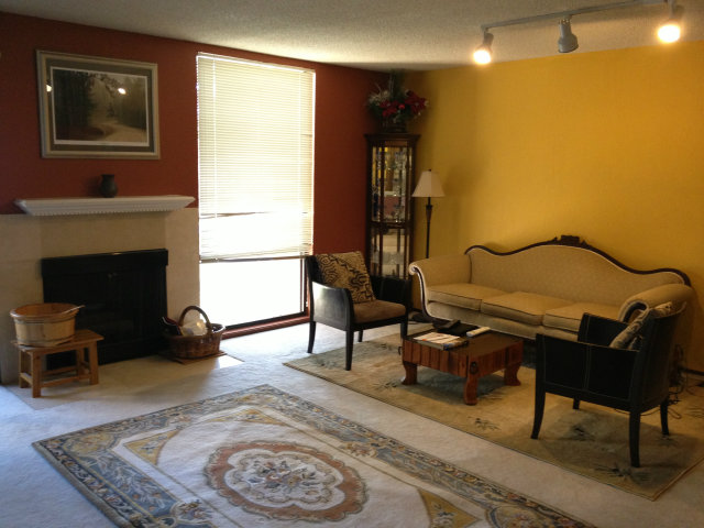 1131 Compass Lane Foster City, CA 94404 - Photo 1 of 18 a living room with furniture and a fireplace