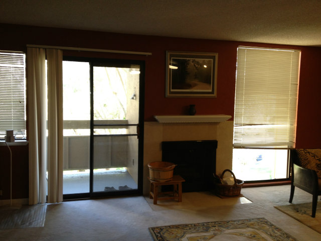 1131 Compass Lane Foster City, CA 94404 - Photo 3 of 18 a living room with furniture and a fireplace