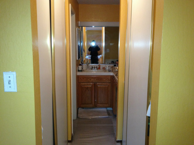 1131 Compass Lane Foster City, CA 94404 - Photo 7 of 18 a bathroom with a mirror and a sink