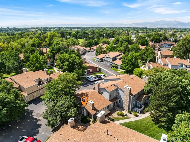 an aerial view of a house with garden space and outdoor space
