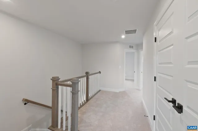 a view of a hallway with closet