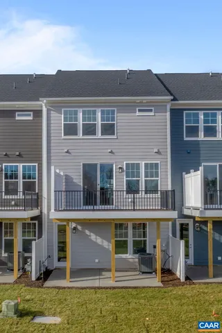 a view of a large building with a yard