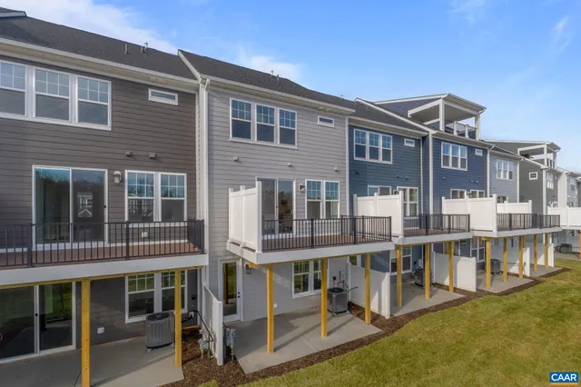 front view of a house with a swimming pool