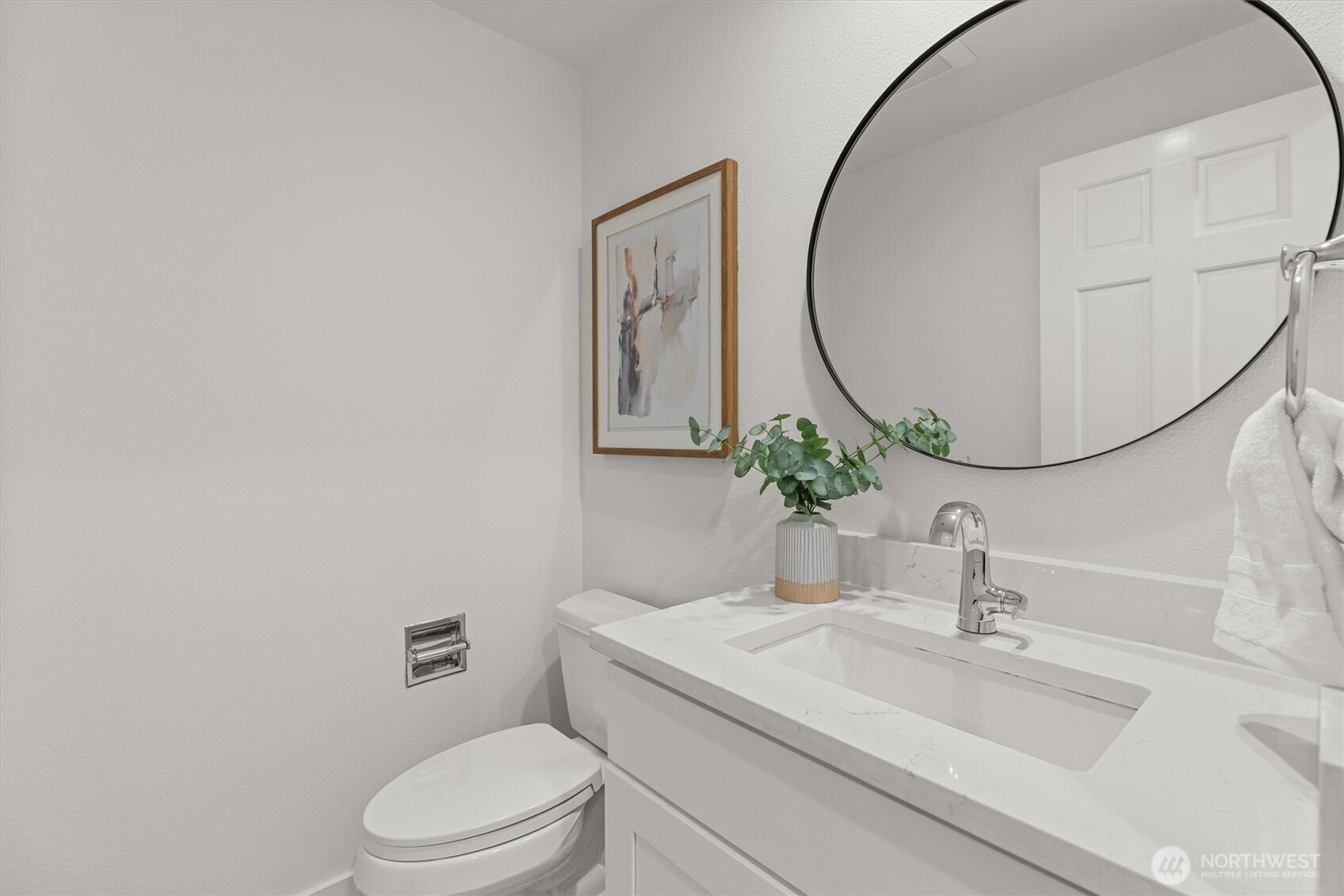 16302 123rd Place Northeast Bothell, WA 98011 - Photo 15 of 37 a bathroom with a sink a toilet and a mirror