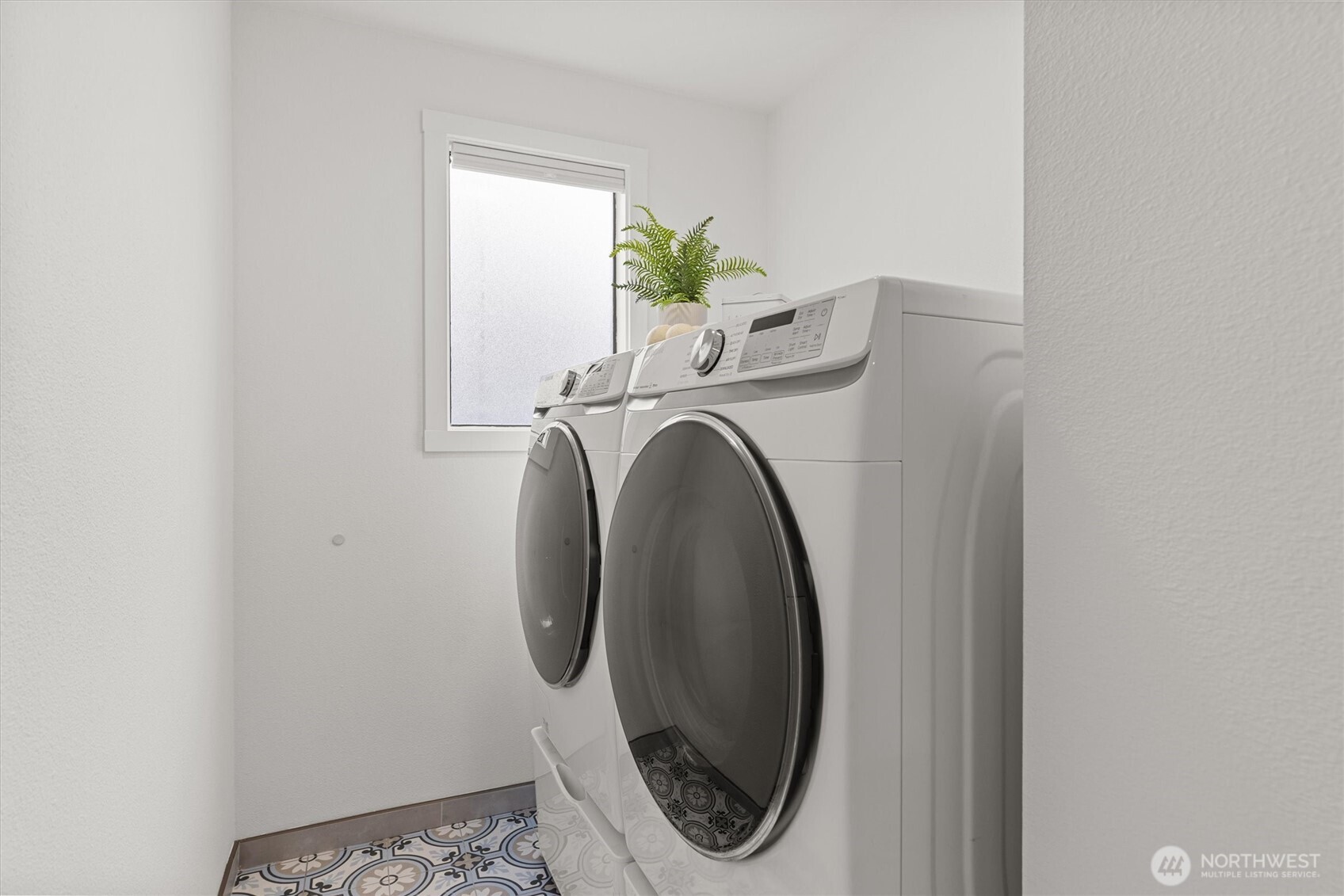16302 123rd Place Northeast Bothell, WA 98011 - Photo 16 of 37 a utility room with dryer and washer