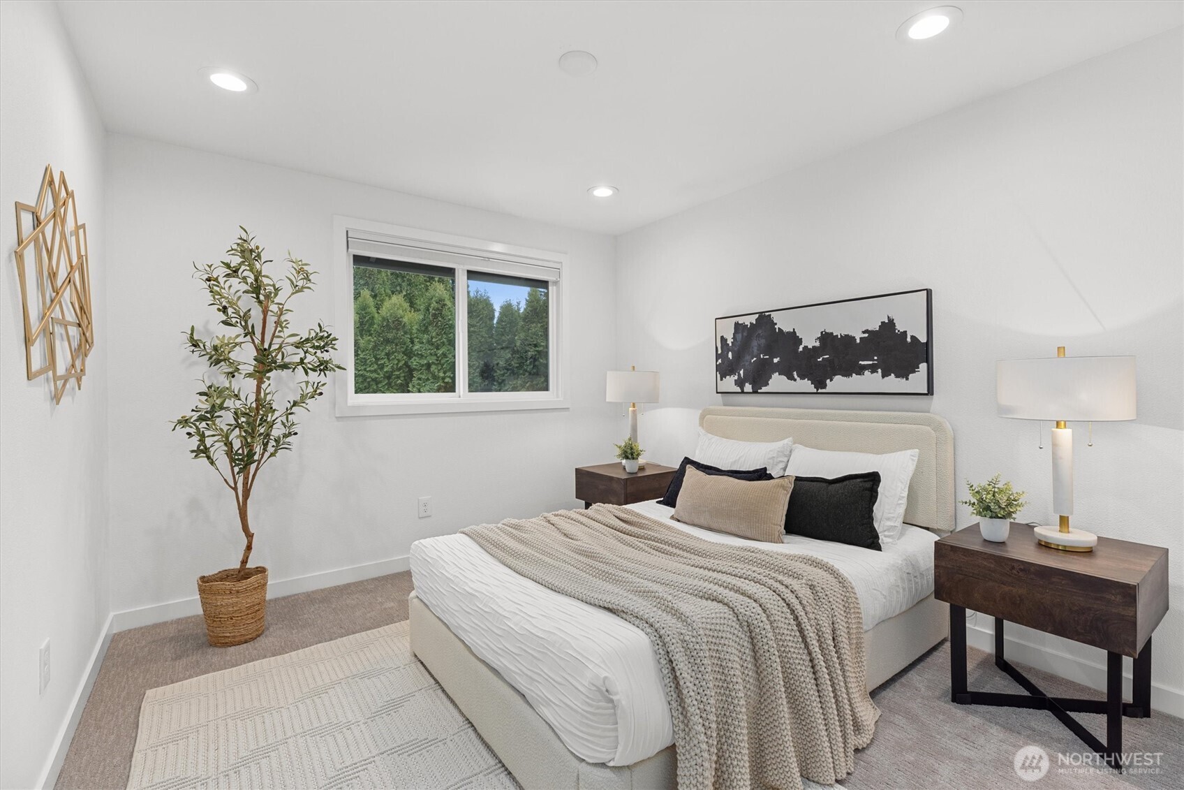 16302 123rd Place Northeast Bothell, WA 98011 - Photo 23 of 37 a bedroom with a large bed and a potted plant
