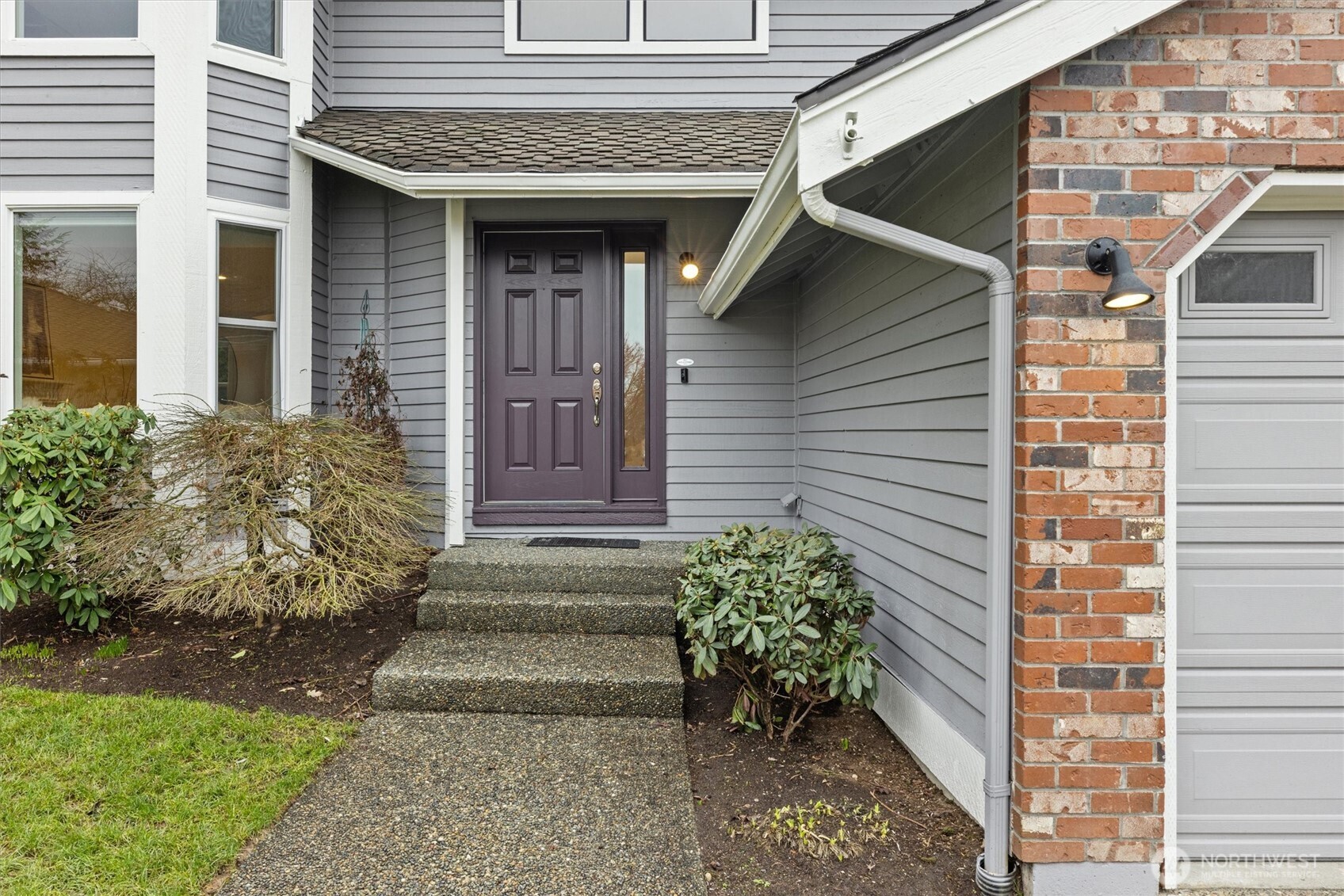16302 123rd Place Northeast Bothell, WA 98011 - Photo 3 of 37 a view of a house with potted plants