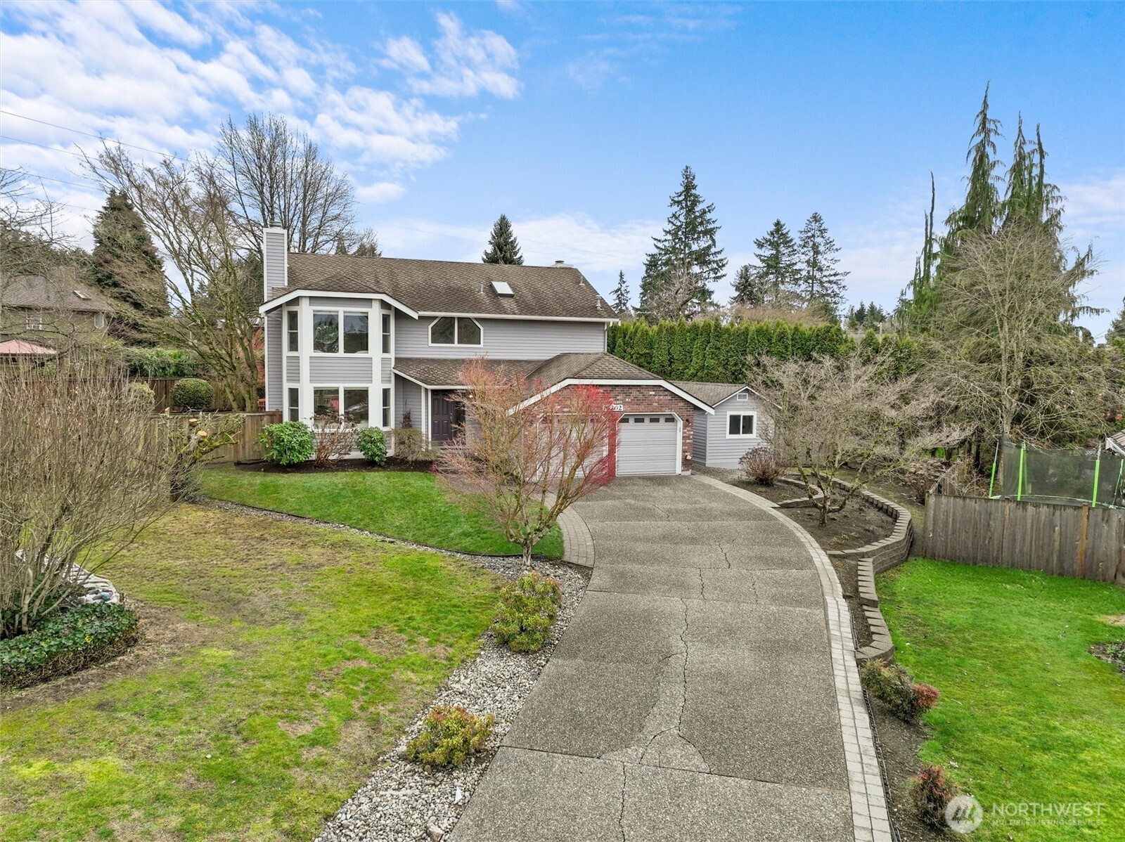 16302 123rd Place Northeast Bothell, WA 98011 - Photo 31 of 37 a front view of a house with garden
