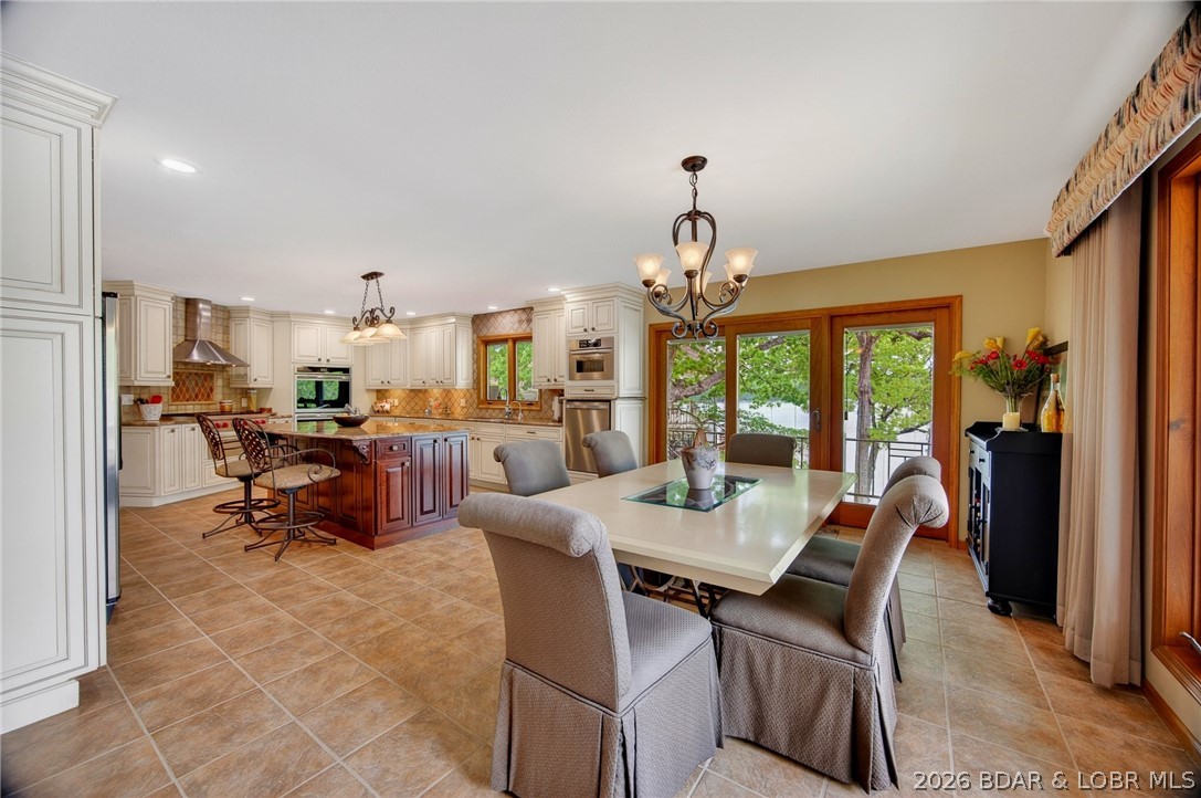 2293 Standing Rock Road Camdenton, MO 65020 - Photo 13 of 99 Dining Area & Well Designed Gourmet Kitchen. NOTE: