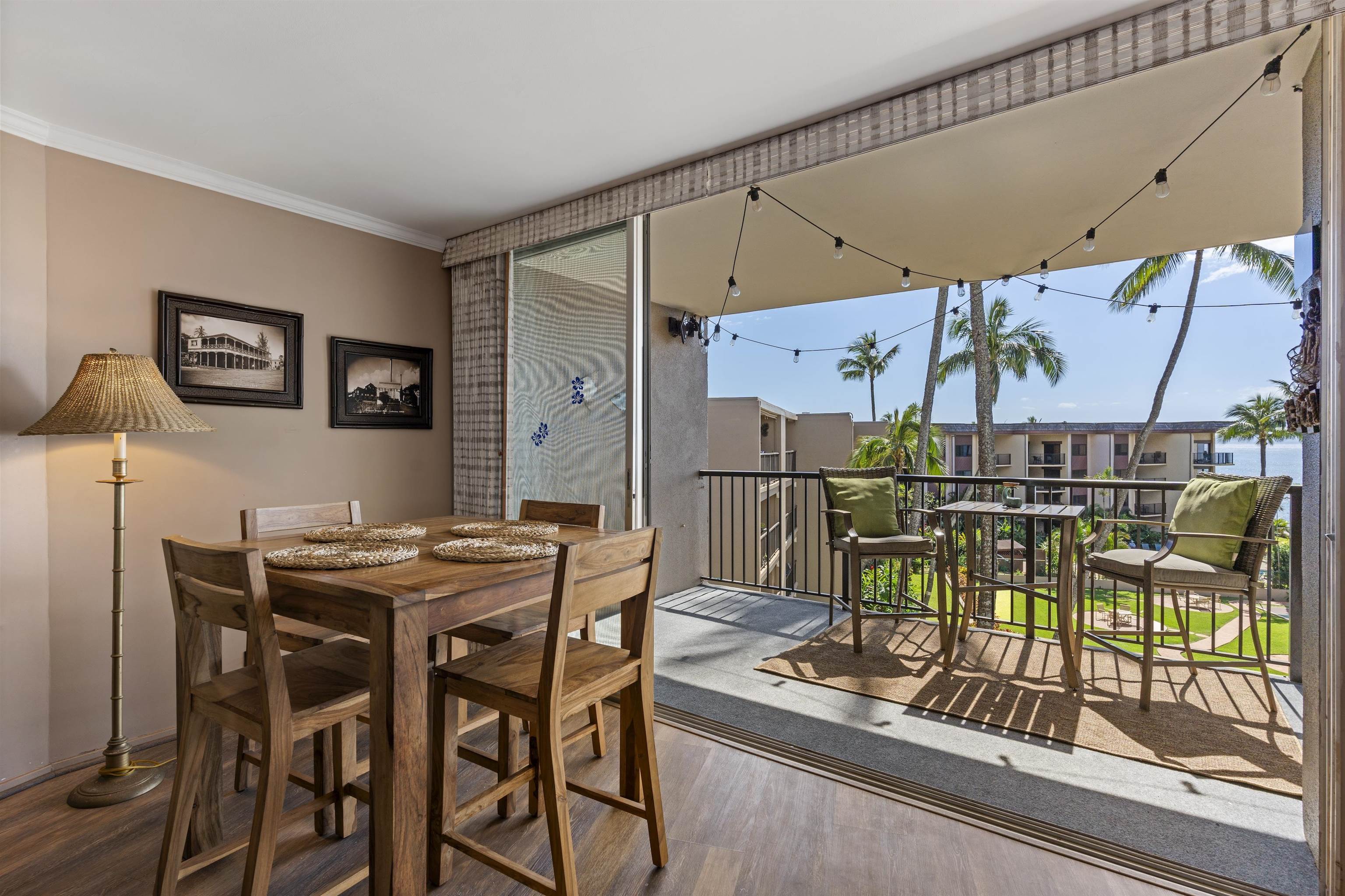3823 Lower Honoapiilani Road, Unit 401 Lahaina, HI 96761 - Photo 22 of 40 a view of a dining room with furniture