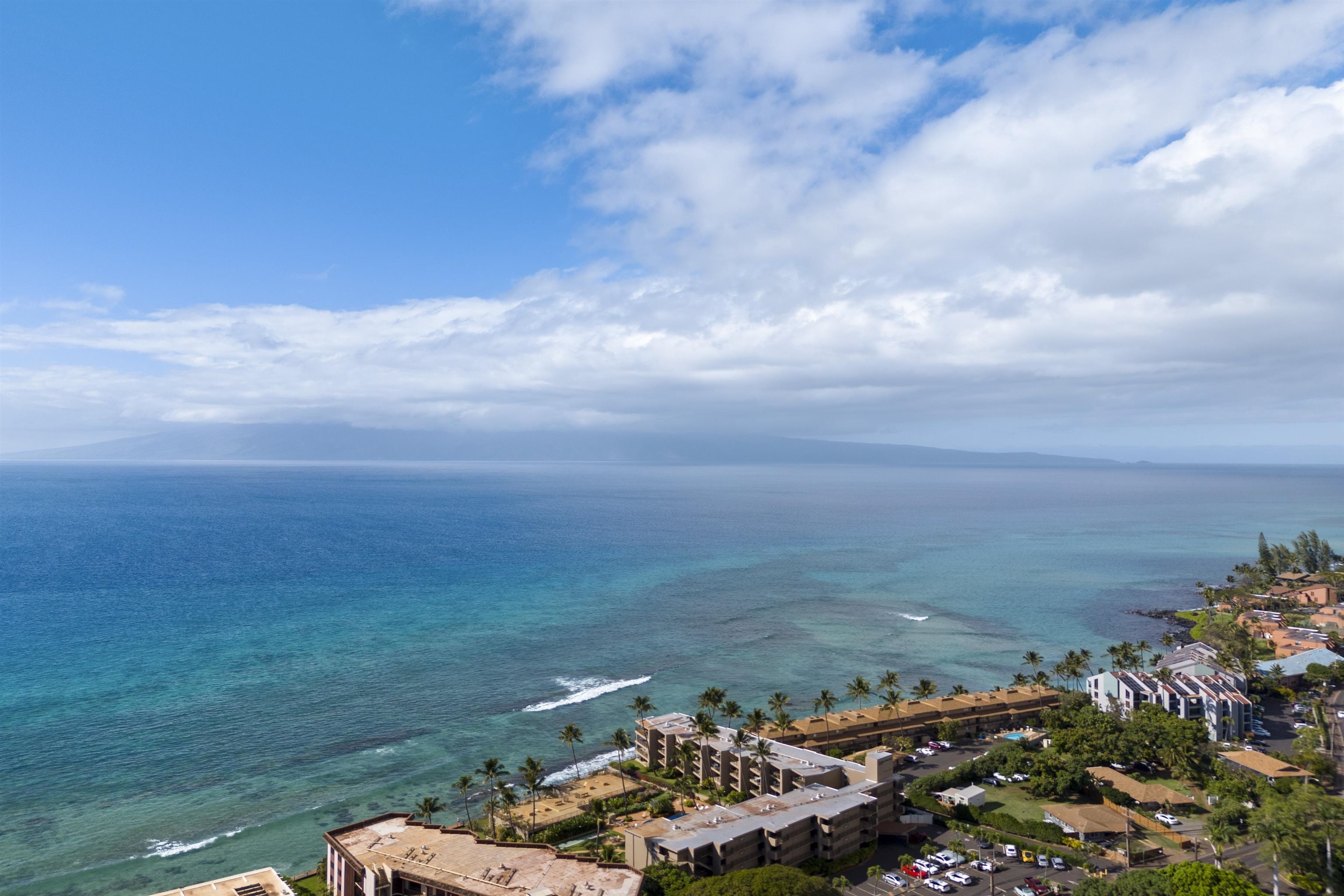 3823 Lower Honoapiilani Road, Unit 401 Lahaina, HI 96761 - Photo 37 of 40 a view of a lake with a big yard