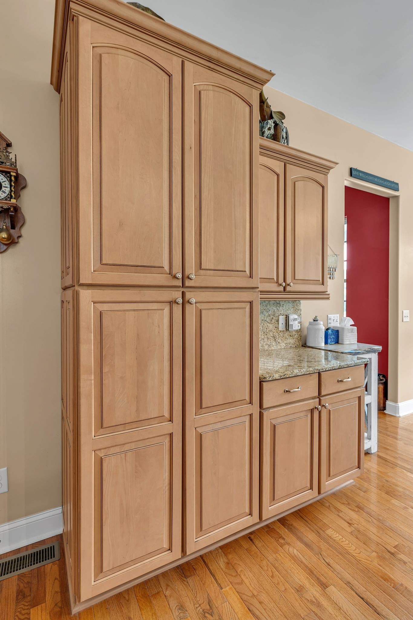 790 Blooming Grove Road Pulaski, TN 38478 - Photo 34 of 74 a view of a kitchen with white cabinets and wooden floor