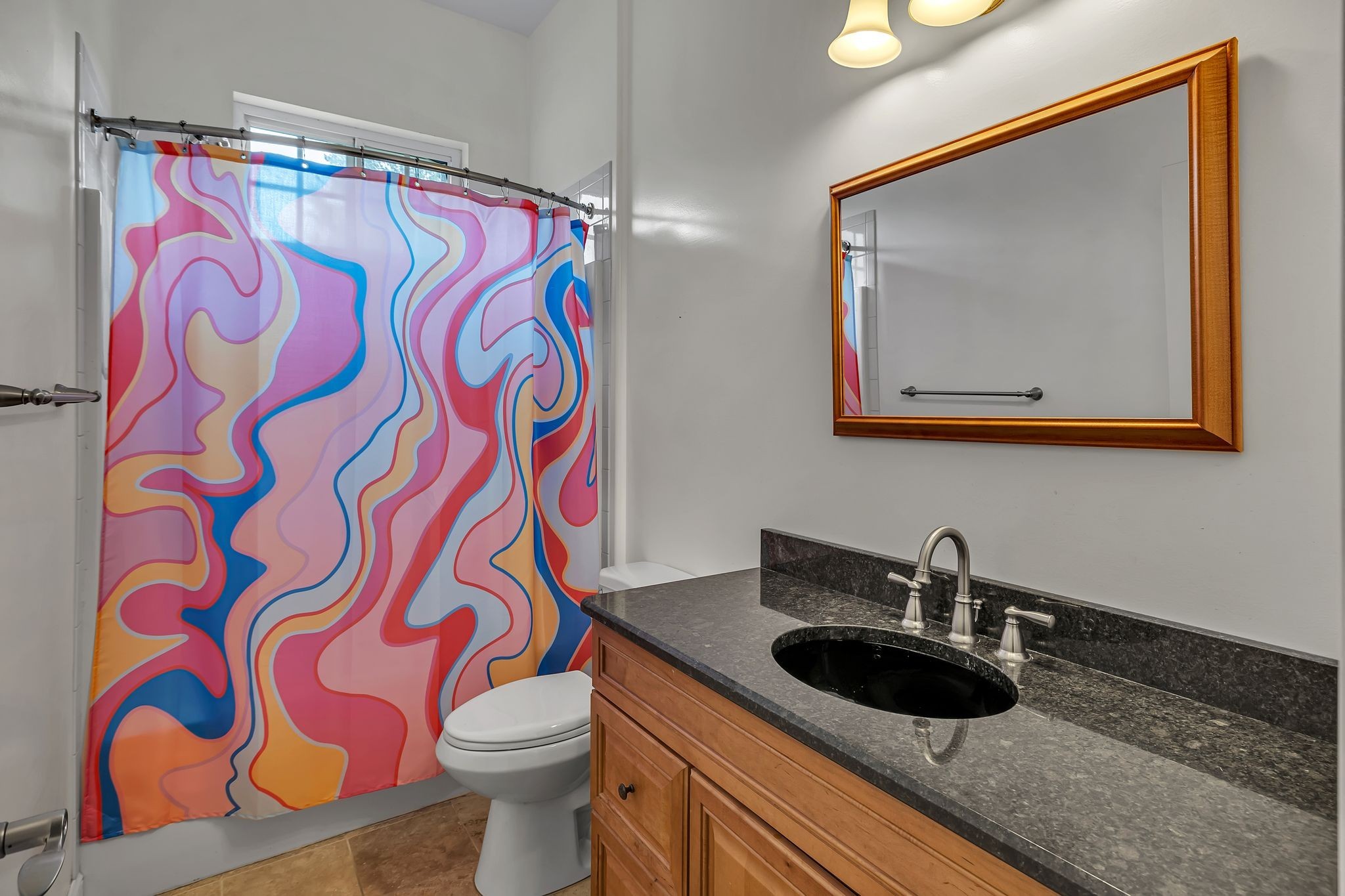 790 Blooming Grove Road Pulaski, TN 38478 - Photo 44 of 74 a bathroom with a sink and mirror with toilet