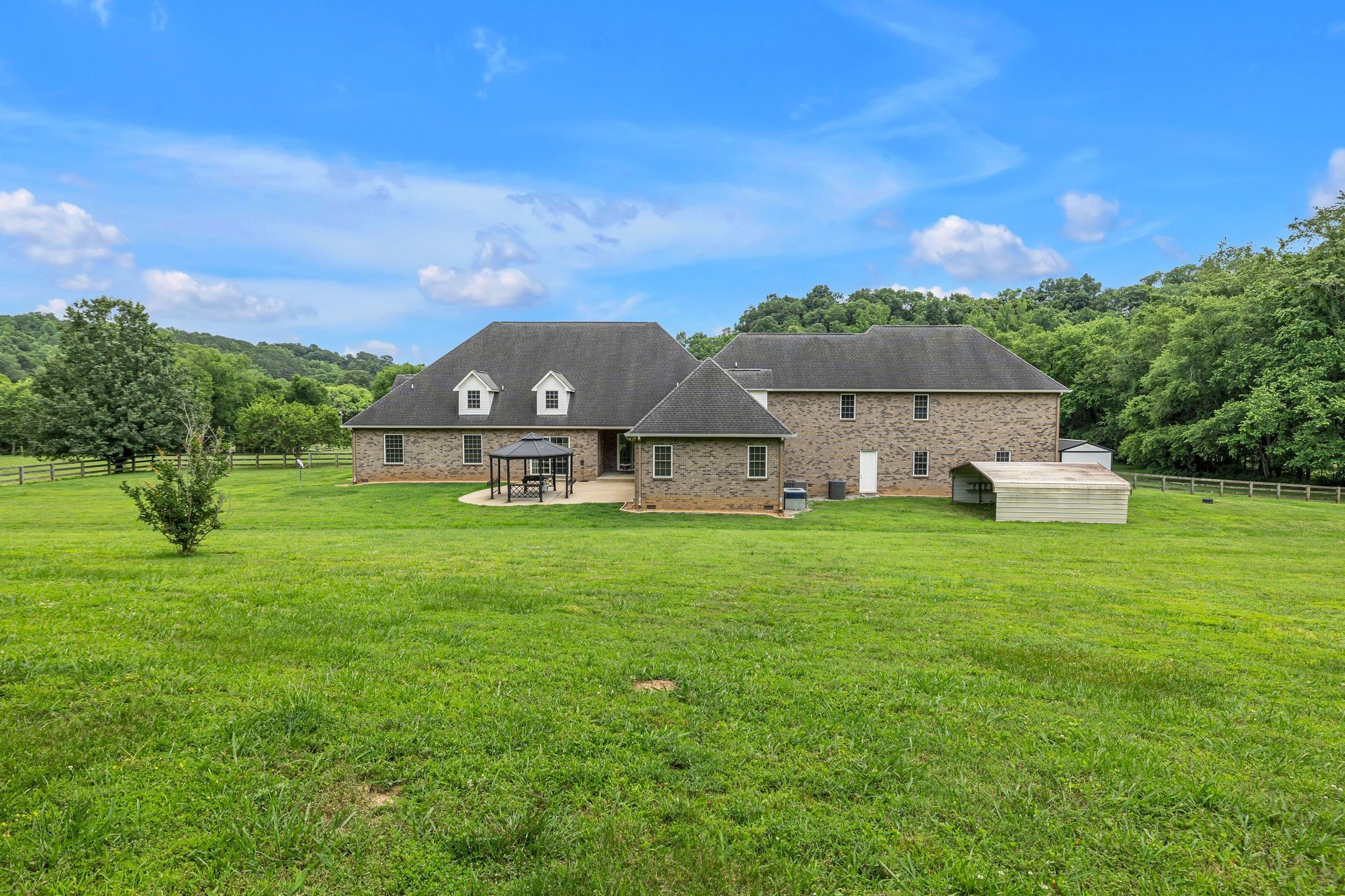 790 Blooming Grove Road Pulaski, TN 38478 - Photo 65 of 74 a view of a house with a big yard