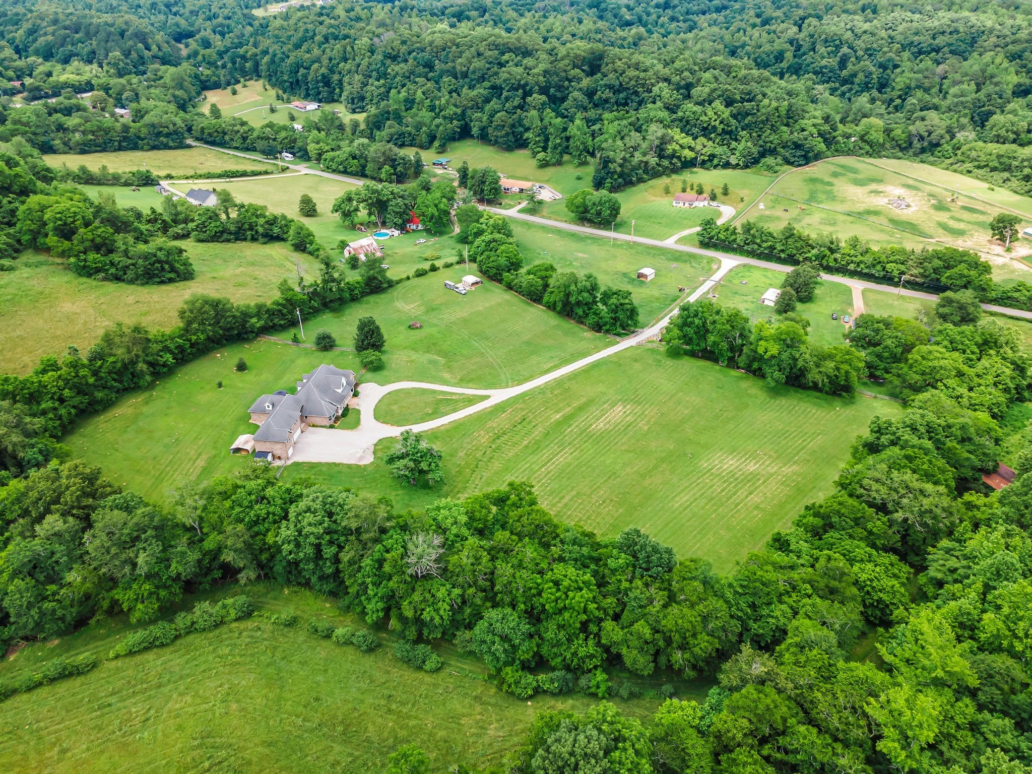 790 Blooming Grove Road Pulaski, TN 38478 - Photo 67 of 67 a view of a green yard with large trees