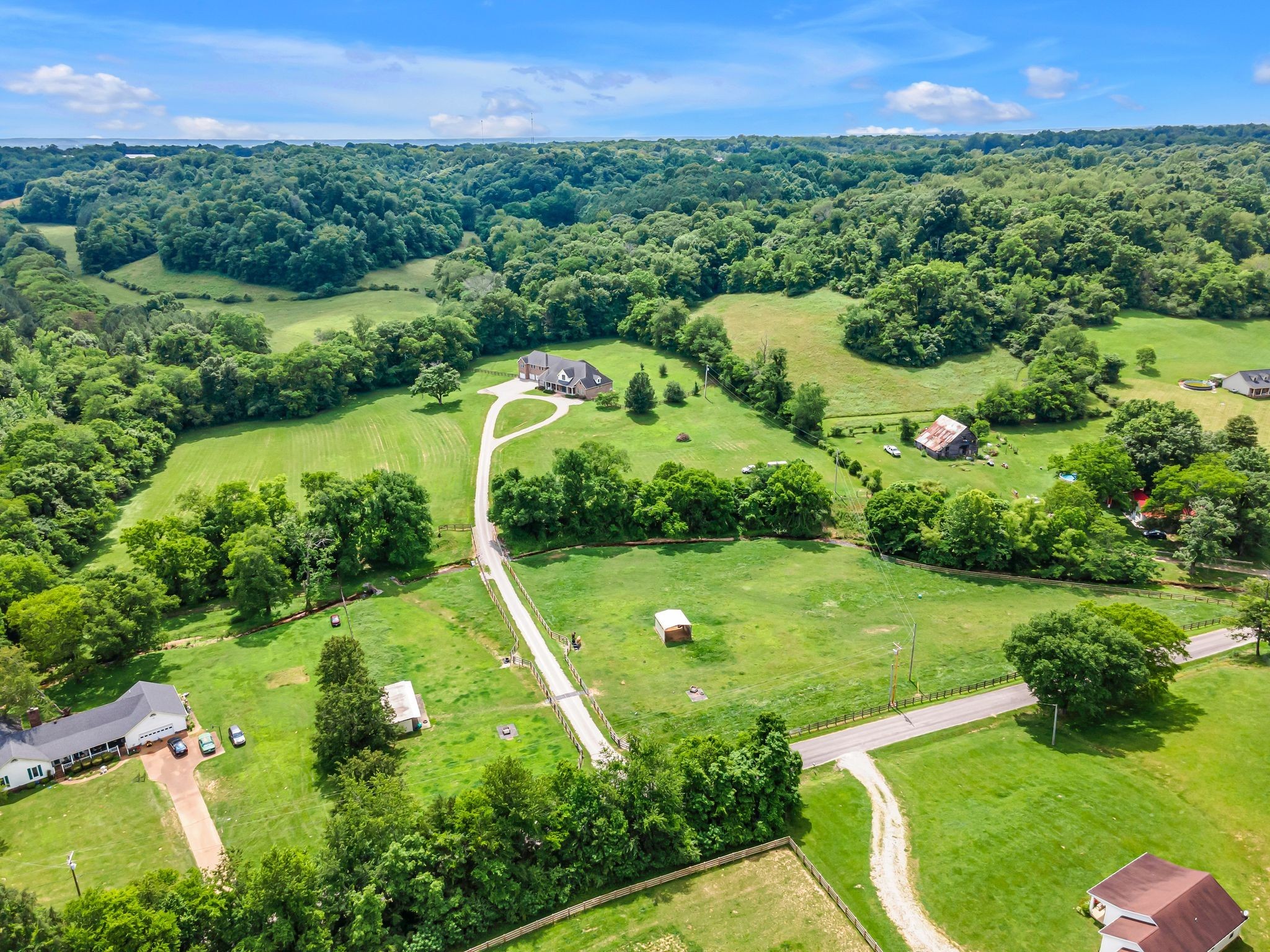 790 Blooming Grove Road Pulaski, TN 38478 - Photo 7 of 67 a view of a city with lush green forest