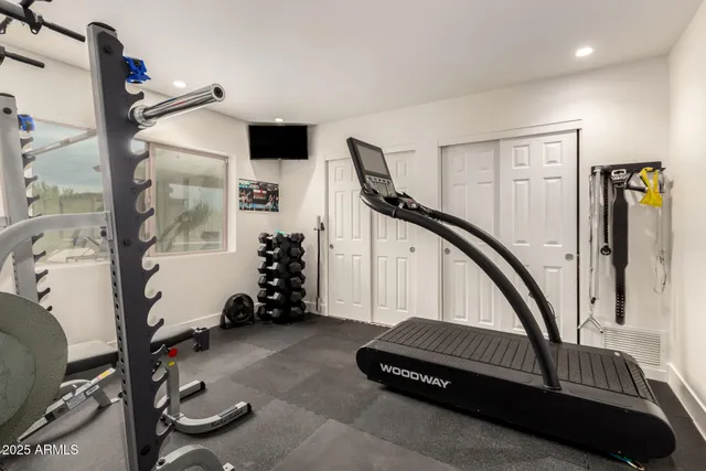 a view of a room with gym equipment