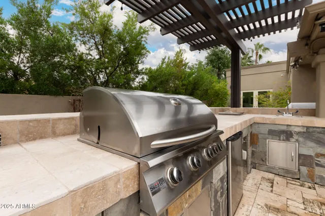 a living room with lots of furniture and a table