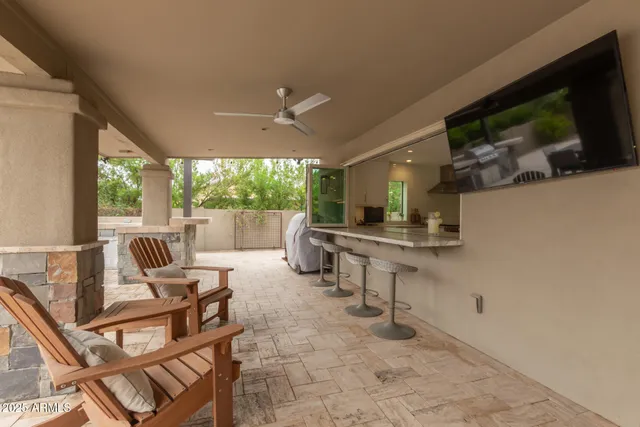 a lobby with furniture and a potted plant
