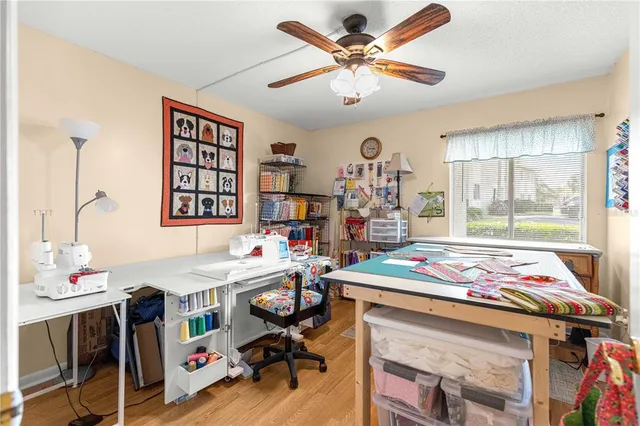 a bathroom with a toilet a sink and a mirror