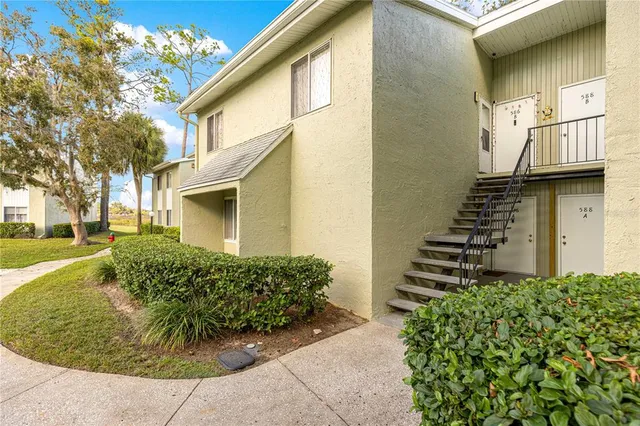 a view of a house with a garden