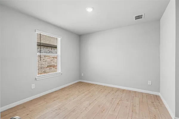 a picture of a bathroom with a shower