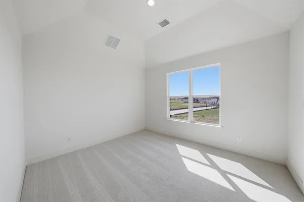a living room with furniture a fireplace and a ceiling fan