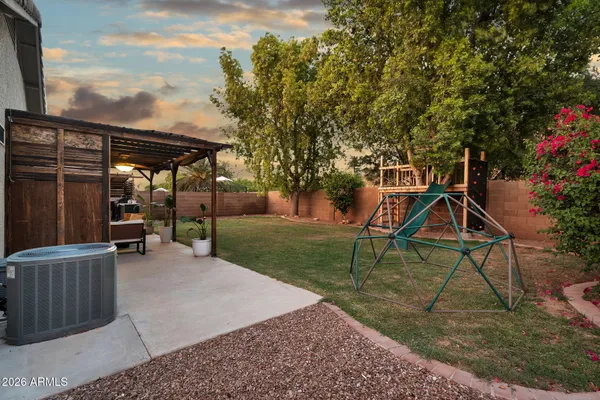 a outdoor living space with furniture and garden