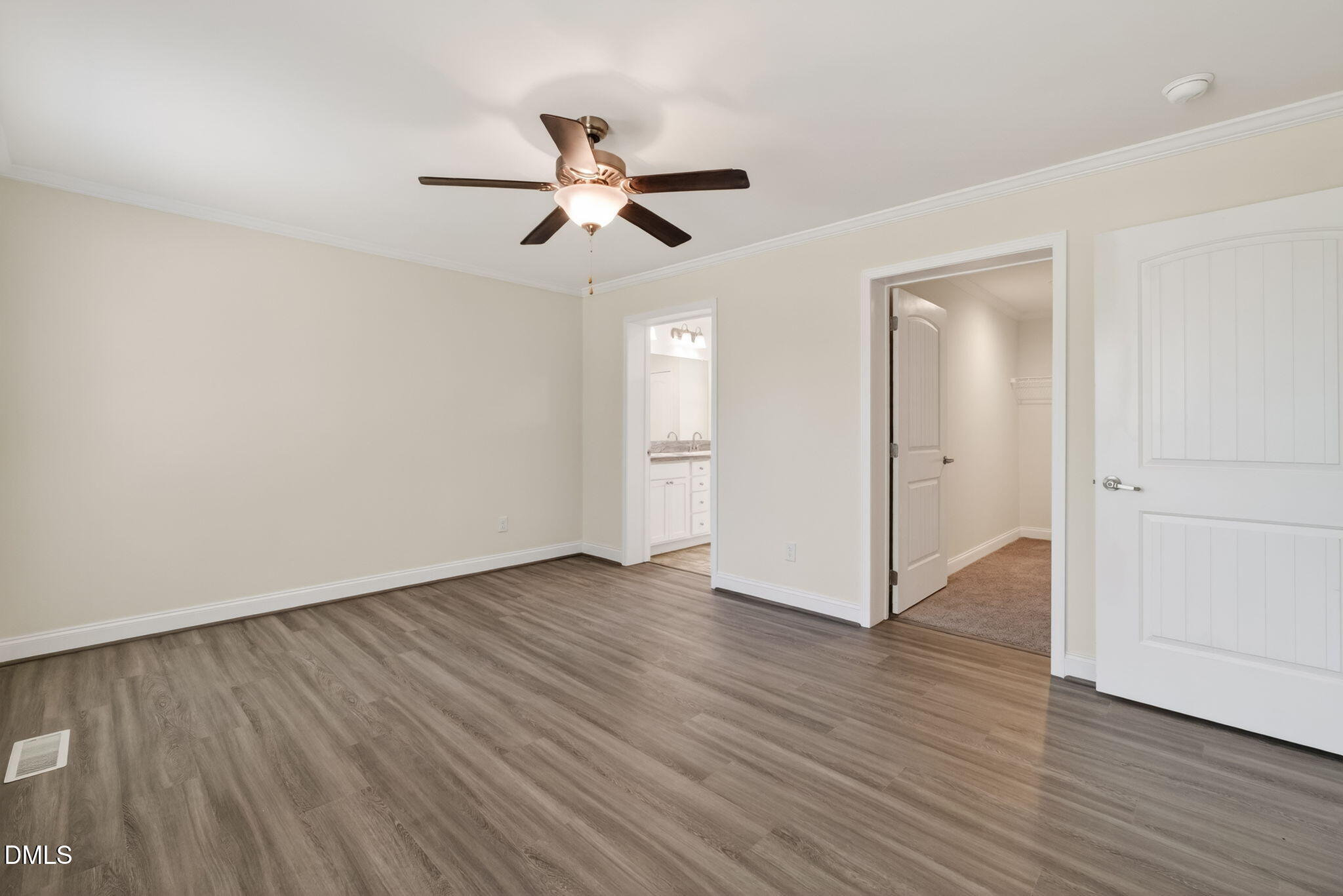 7122 Guess Road Hillsborough, NC 27278 - Photo 27 of 48 an empty room with wooden floor closet and windows