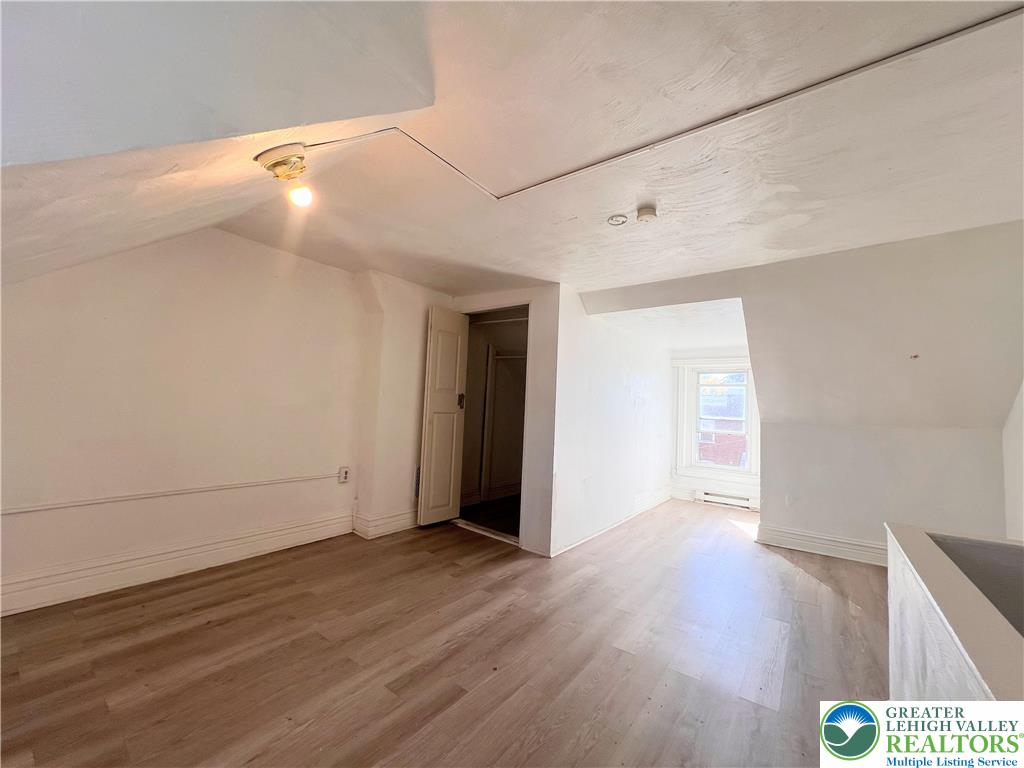 215 South Franklin Street Allentown, PA 18102 - Photo 11 of 13 a view of an empty room with wooden floor
