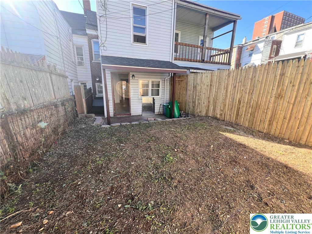 215 South Franklin Street Allentown, PA 18102 - Photo 12 of 13 a front view of a house with a yard