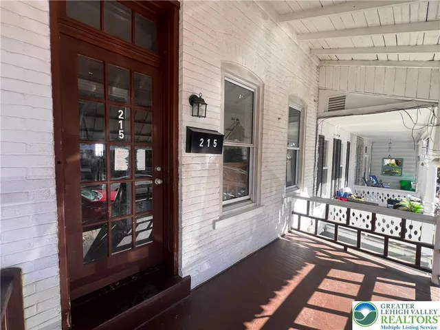a view of a balcony with a potted plant