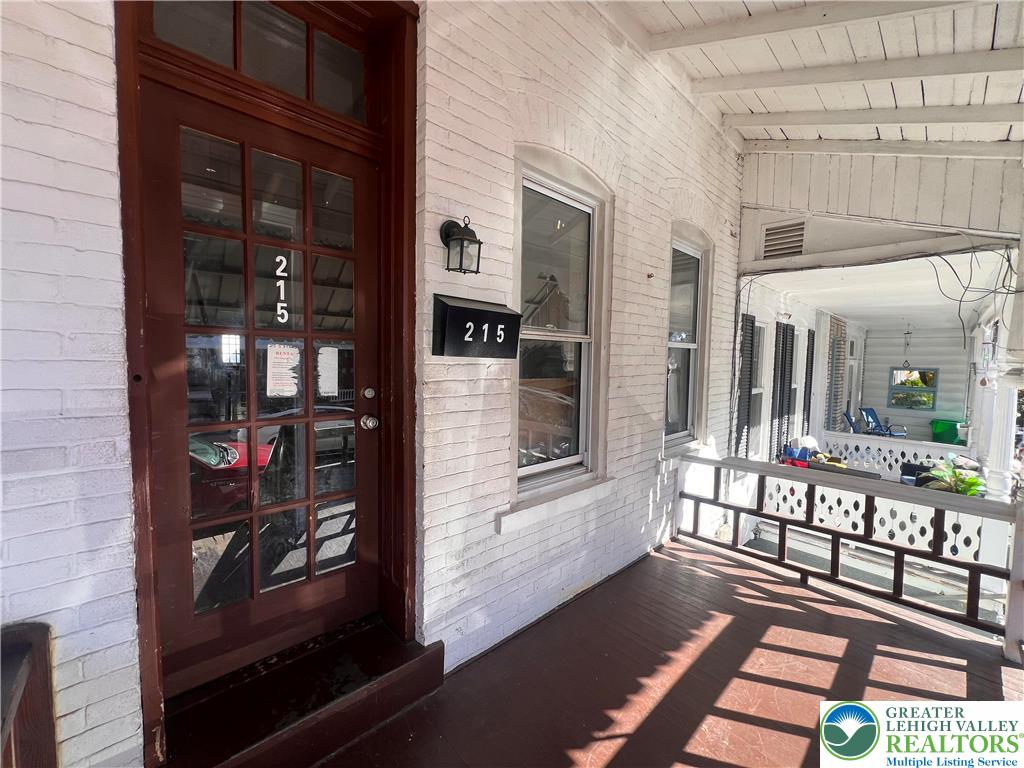 215 South Franklin Street Allentown, PA 18102 - Photo 2 of 13 a view of a balcony with a potted plant