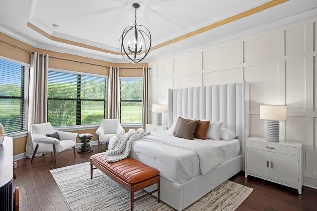 a bathroom with a granite countertop sink toilet a mirror and shower