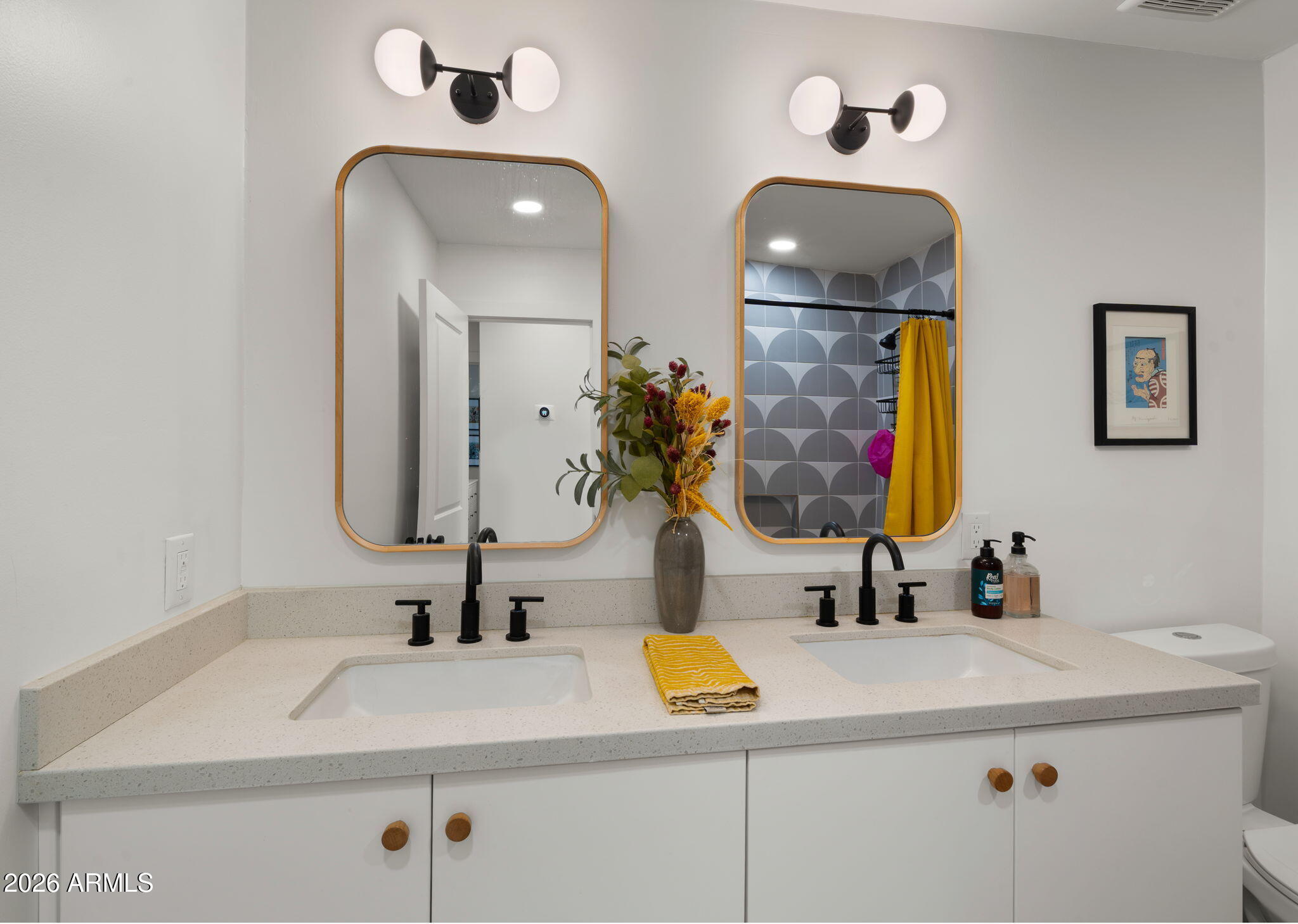 2115 North Normal Avenue Tempe, AZ 85288 - Photo 17 of 38 a bathroom with double vanity sinks and a mirror