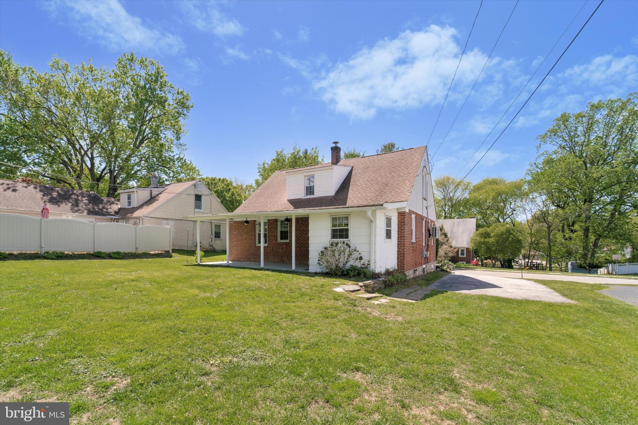 307 Madison Road Springfield, PA 19064 - Photo 23 of 29 a view of a house with a yard