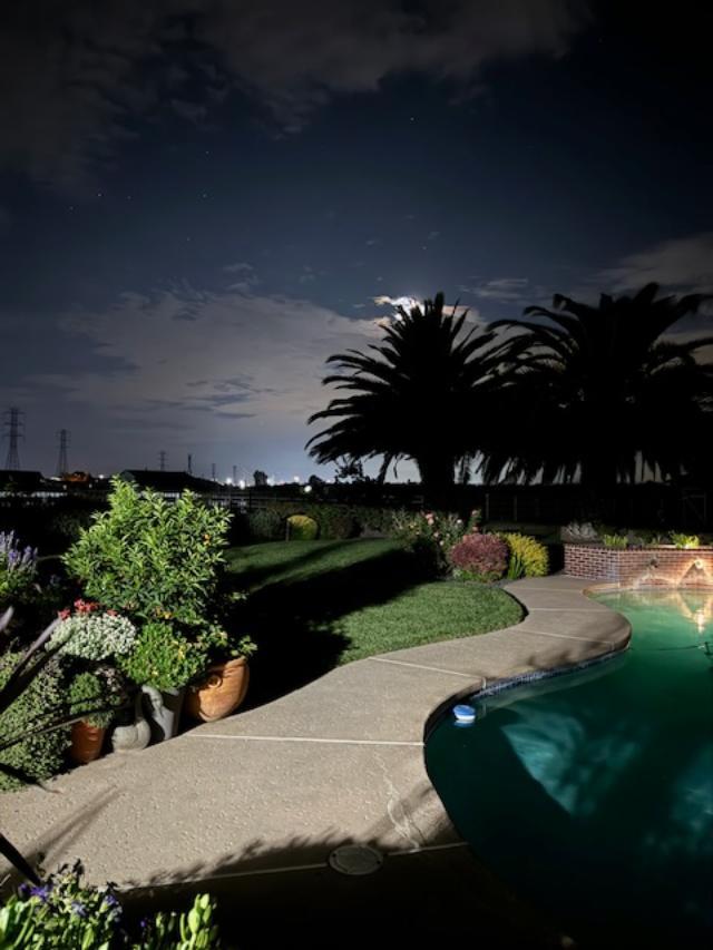 21055 Corral Hollow Road Tracy, CA 95304 - Photo 16 of 19 a view of a backyard