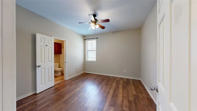 a view of livingroom with hardwood floor and ceiling fan