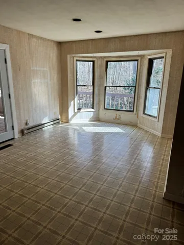a kitchen with stainless steel appliances granite countertop a stove and a cabinets