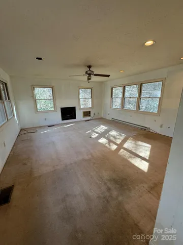 a living room with a fireplace