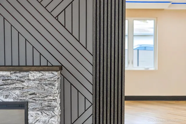 a kitchen with a table and chairs