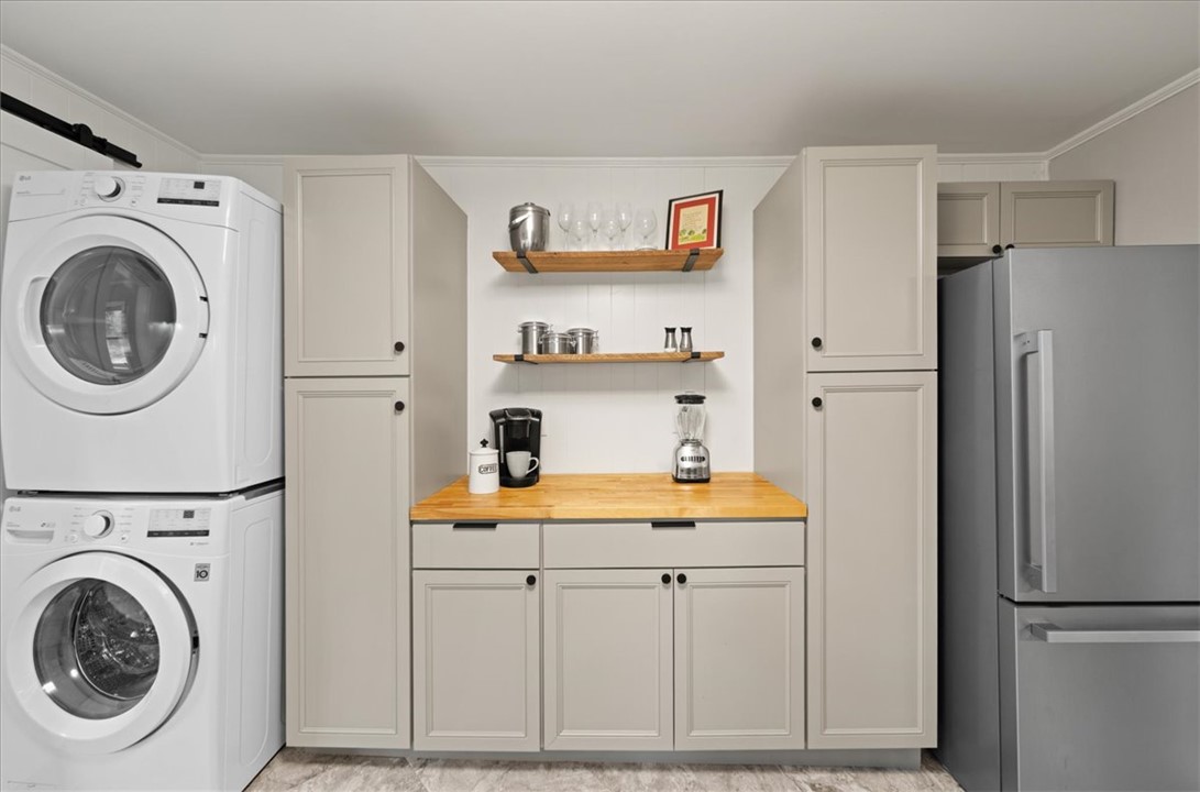 174 Holliday Road Six Mile, SC 29682 - Photo 18 of 49 Functional laundry room and coffee bar offers ample storage and modern efficiency