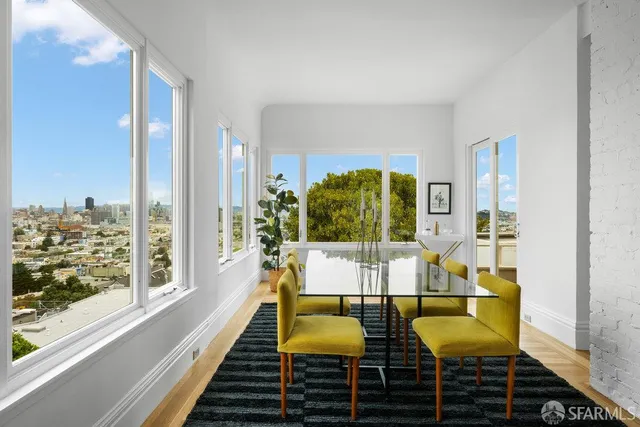 a view of a balcony with lake view and a floor to ceiling window