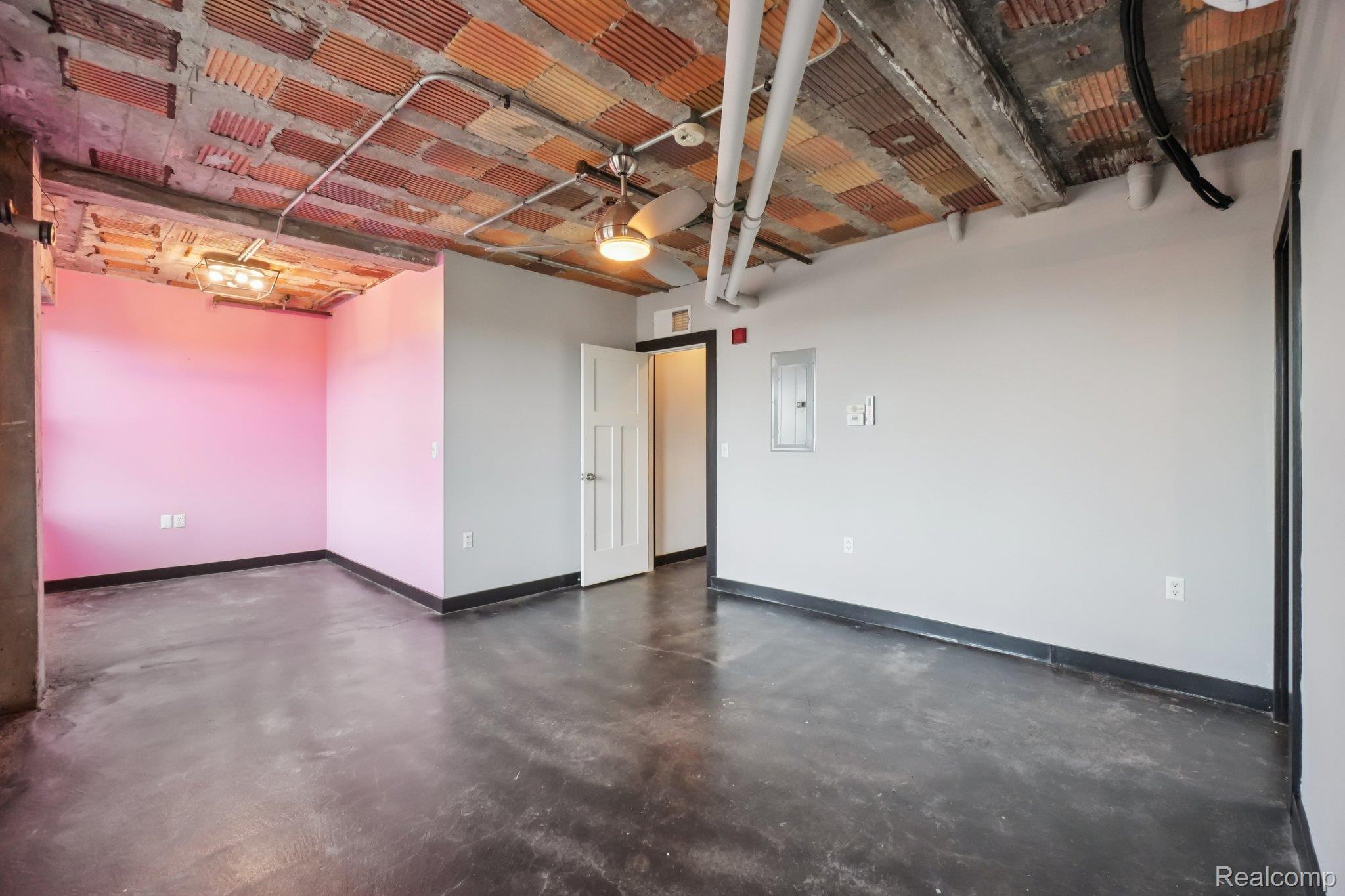 2915 John R Street Detroit, MI 48201 - Photo 9 of 30 Garage featuring baseboards and electric panel