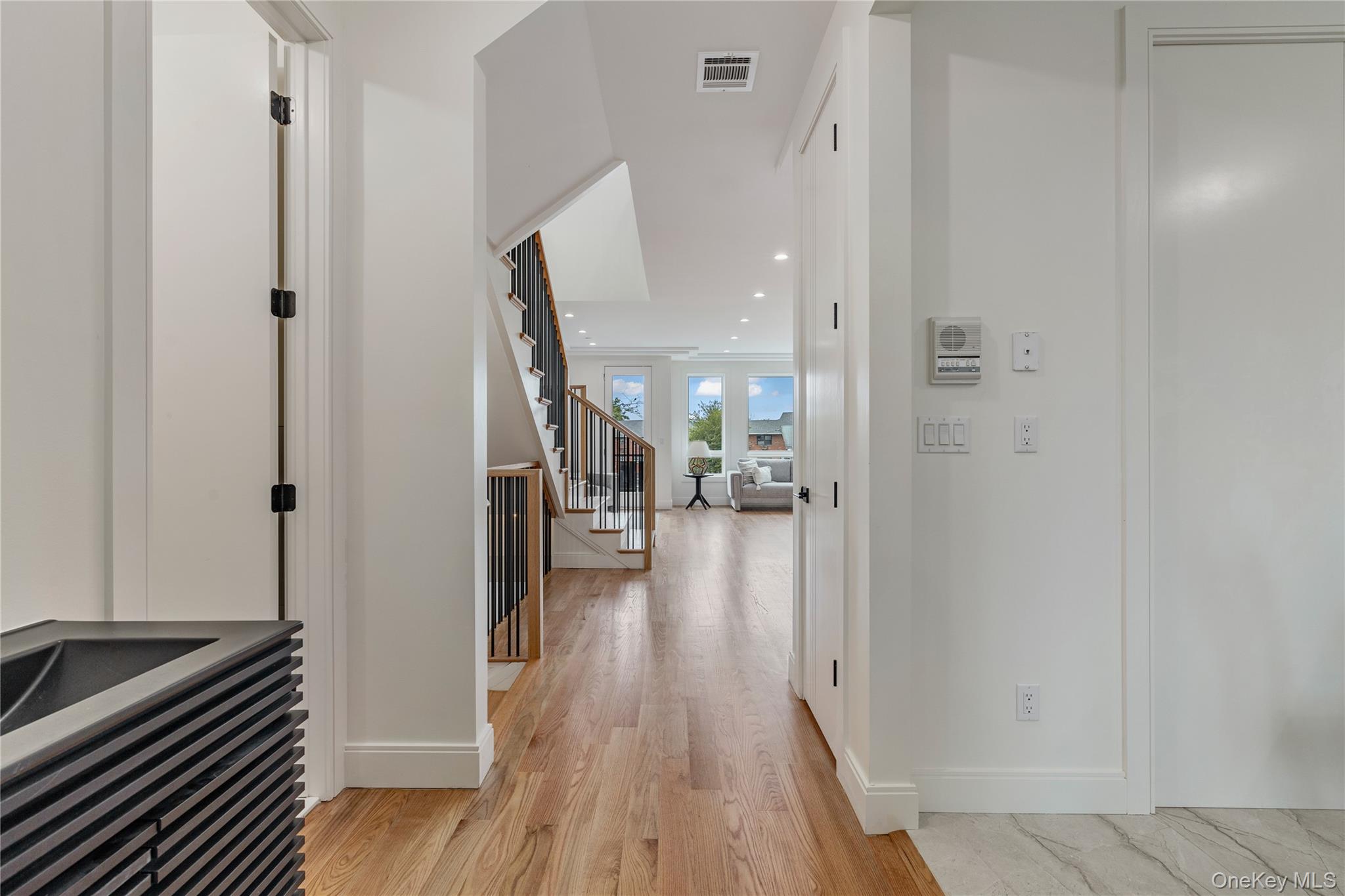 17 Union Road, Unit 206 Spring Valley, NY 10977 - Photo 24 of 41 a view of a hallway view with wooden floor and staircase