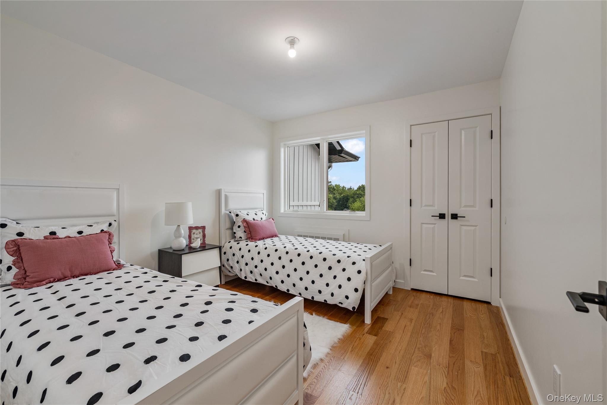 17 Union Road, Unit 206 Spring Valley, NY 10977 - Photo 34 of 41 a bedroom with double bed and a window