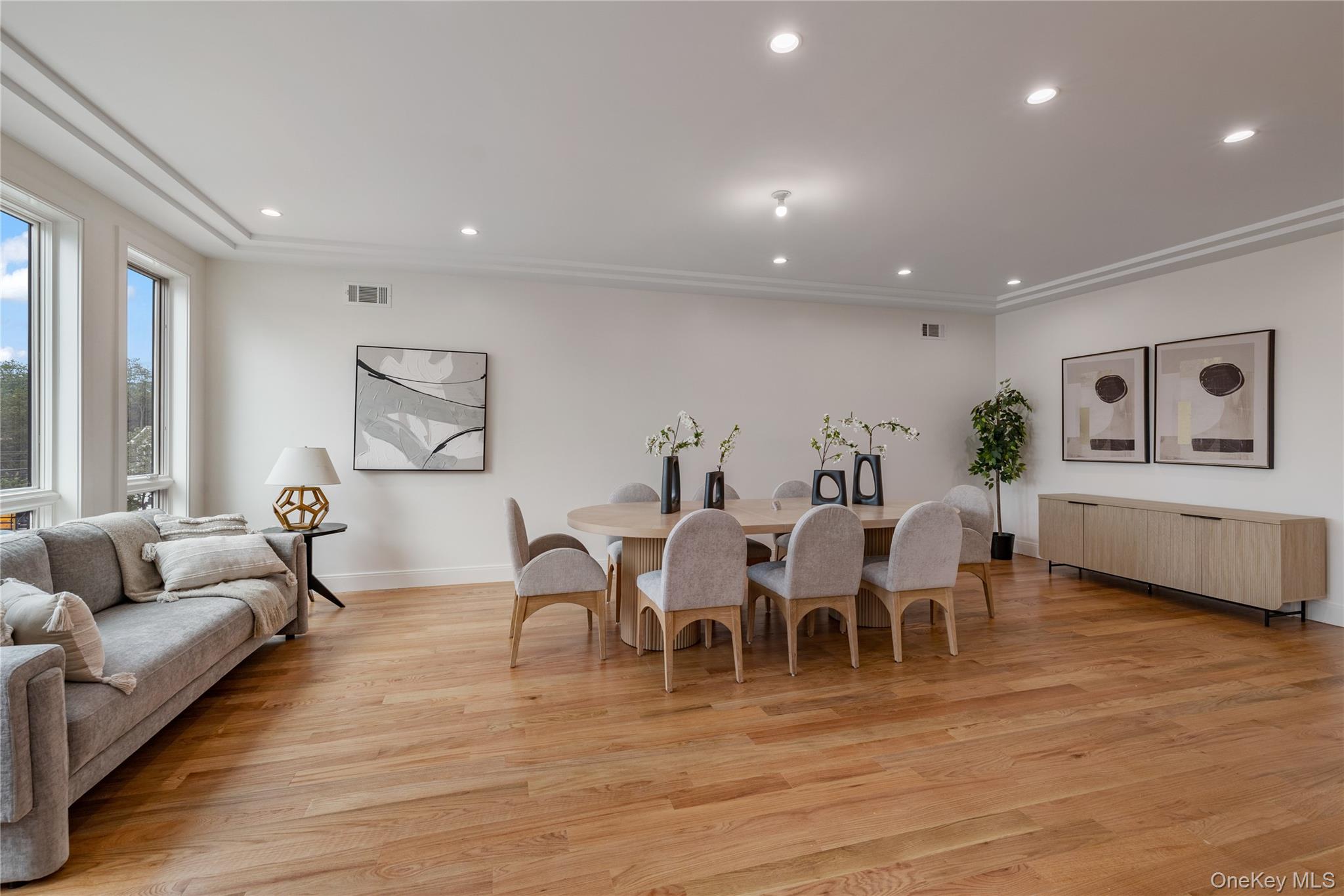 17 Union Road, Unit 206 Spring Valley, NY 10977 - Photo 10 of 41 a living room with lots of furniture and a wooden floor