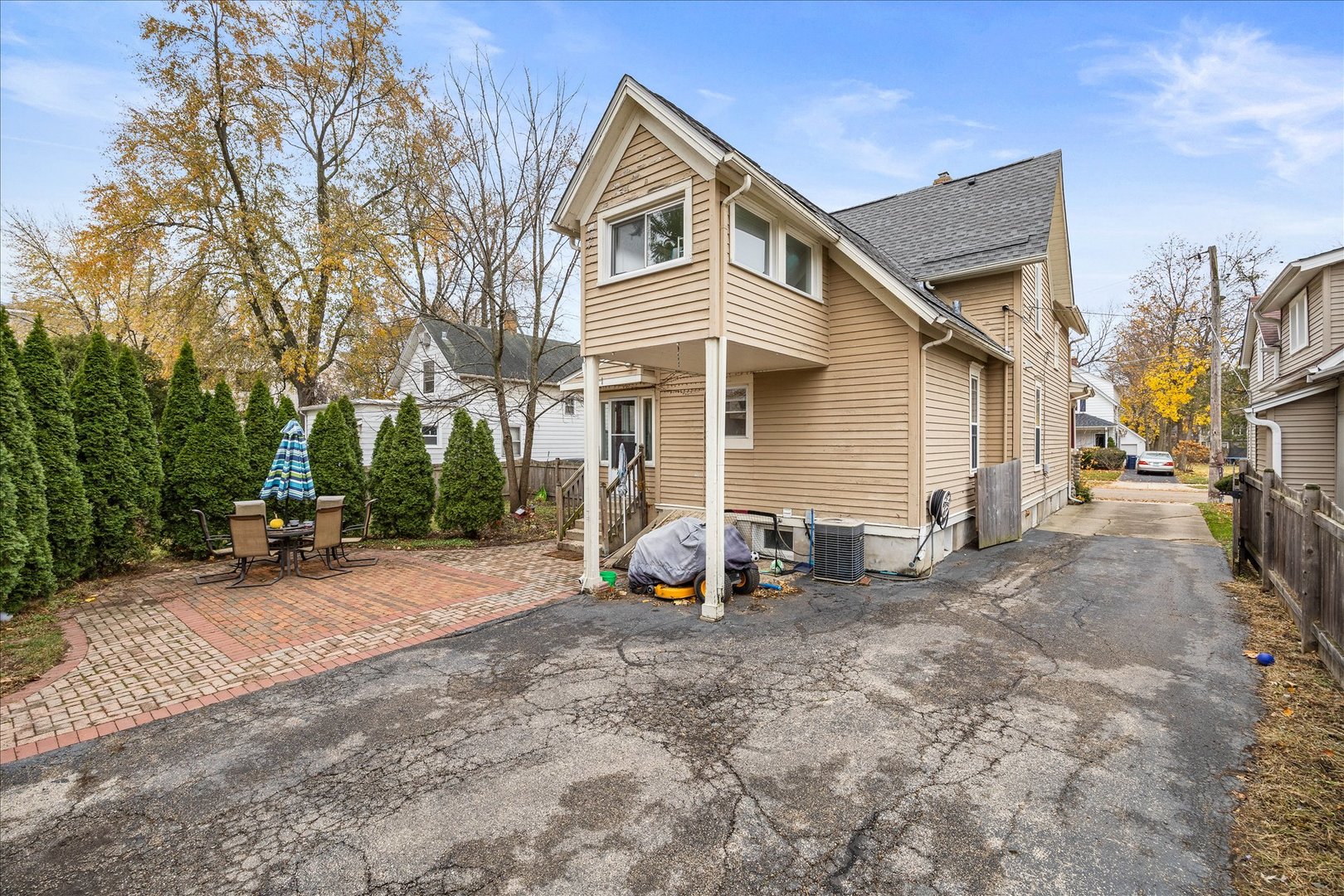 1017 Center Street Elgin, IL 60120 - Photo 27 of 27 a view of a house with backyard and chairs